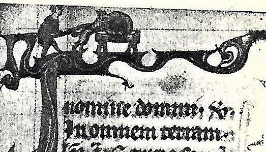 Man forces a dog/fox’s nose down onto a grindstone